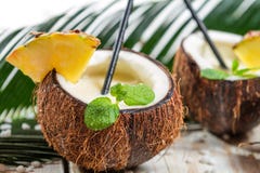 Pinacolada Drink With Mint Served In A Fresh Coconut Stock Photo Image Of Caribbean Circle 29234442