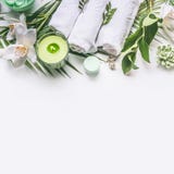 Pink herbal natural facial cosmetic products set with herbs and flowers on white background royalty free stock image Pink herbal natural facial cosmetic products set with herbs and flowers on white background royalty free stock image