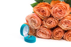 Pink roses and box holding wedding ring isolated on white background - Image royalty free stock images Pink roses and box holding wedding ring isolated on white background - Image royalty free stock images