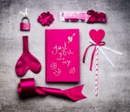 Pink Valentines day decoration tools : heart, ribbon, loop, key lock, balloon, day book with handwritten lettering Just you and my stock photo Pink Valentines day decoration tools : heart, ribbon, loop, key lock, balloon, day book with handwritten lettering Just you and my stock photo