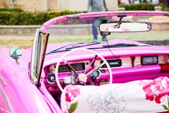 Pink Vintage Classic Interior Of American Car Parked On The Street Of Old Havana, Cuba Royalty Free Stock Photography Pink Vintage Classic Interior Of American Car Parked On The Street Of Old Havana, Cuba Royalty Free Stock Photography