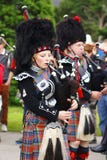 Pipe band woman at Newtonmore highland games