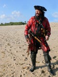 Pirate On The Beach In Vintage Costume Stock Images