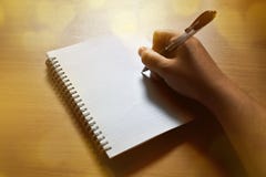 Pisać na notatniku zdjęcie stock Pisać na notatniku zdjęcie stock