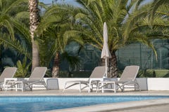 Piscina tropical imagem de stock royalty free Piscina tropical imagem de stock royalty free