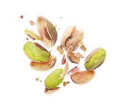 Pistachio Crushed Into Pieces, Frozen In The Air Close-up Stock Photos Pistachio Crushed Into Pieces, Frozen In The Air Close-up Stock Photos
