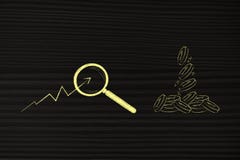 Pièces de monnaie laissant tomber le signe des bénéfices et de la stat positive avec le magnifyin Photographie stock libre de droits Pièces de monnaie laissant tomber le signe des bénéfices et de la stat positive avec le magnifyin Photographie stock libre de droits