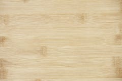 Placa feita da madeira de bambu natural Fundo do teste padrão das texturas na luz - cor marrom bege de creme amarela imagem de stock Placa feita da madeira de bambu natural Fundo do teste padrão das texturas na luz - cor marrom bege de creme amarela imagem de stock