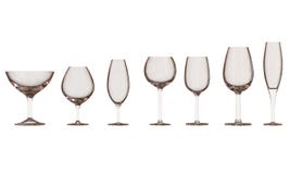 Placez des verres de vin d'isolement sur le fond blanc photographie stock Placez des verres de vin d'isolement sur le fond blanc photographie stock