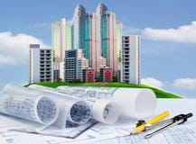 Plan of building construction on engineer working table against stock image Plan of building construction on engineer working table against stock image
