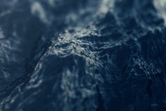 Plan rapproché de vague de mer, vue d'angle faible avec des effets de bokeh rendu 3d photographie stock libre de droits Plan rapproché de vague de mer, vue d'angle faible avec des effets de bokeh rendu 3d photographie stock libre de droits