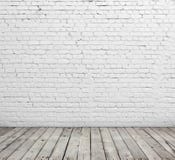 Plancher blanc de mur de briques et en bois image stock Plancher blanc de mur de briques et en bois image stock