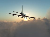 Plane In Flight Over Clouds Royalty Free Stock Photography