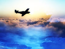 Plane Over The Clouds 3 Stock Photo