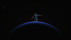 Planet and a football player