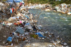 Plastic Garbage Polution in mountain stream Stock Photography Plastic Garbage Polution in mountain stream Stock Photography