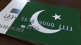 Plastic betaalpas die vlag van Pakistan kenmerken De Pakistaanse nationale verwante animatie van het bankwezensysteem royalty-vrije illustratie Plastic betaalpas die vlag van Pakistan kenmerken De Pakistaanse nationale verwante animatie van het bankwezensysteem royalty-vrije illustratie
