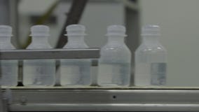 Plastic bottles on medical solutions conveyor blow fill seal technology technique used to produce liquid-filled