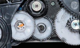 Plastic cog wheels from a printer cartridge. stock photos Plastic cog wheels from a printer cartridge. stock photos