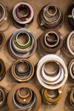 Plastic pre glued edge banding tape for furniture decor and repair. Object is hanging on a wall in a workshop royalty free stock photos Plastic pre glued edge banding tape for furniture decor and repair. Object is hanging on a wall in a workshop royalty free stock photos