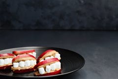 Plate of Halloween Peanut Butter and Apple Mouths Stock Photo Plate of Halloween Peanut Butter and Apple Mouths Stock Photo