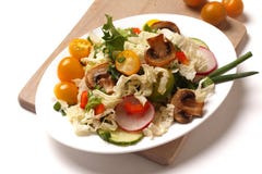 A plate of salad with vegetables, mushrooms and herbs stock photography A plate of salad with vegetables, mushrooms and herbs stock photography