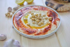 Plate of Traditional homemade hummus stock photo Plate of Traditional homemade hummus stock photo