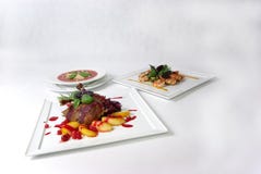 Plates Of Fine Dining Meal Royalty Free Stock Image