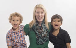Playful mother with two laughing boys royalty free stock photography Playful mother with two laughing boys royalty free stock photography