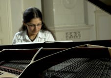 Playing An Open Baby Grand Stock Photo Playing An Open Baby Grand Stock Photo