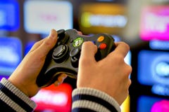 Playing Video Games On Xbox Console, TV Background Stock Photo Playing Video Games On Xbox Console, TV Background Stock Photo