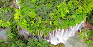 Plitvice National Park, Croatia, Europe. Amazing view over the lakes and waterfalls surrounded by forest stock image Plitvice National Park, Croatia, Europe. Amazing view over the lakes and waterfalls surrounded by forest stock image