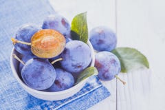 Plums On The White Wooden Table Stock Photos Plums On The White Wooden Table Stock Photos