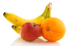 Plátanos manzana y naranja foto de archivo libre de regalías Plátanos manzana y naranja foto de archivo libre de regalías