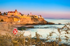 Poca Beach in Estoril, Portugal at Colorful Sunset stock images Poca Beach in Estoril, Portugal at Colorful Sunset stock images