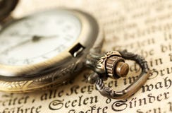 Pocket Watch On Book Stock Photo
