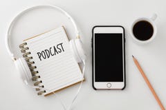 Podcast concept with smartphone and headphones stock images Podcast concept with smartphone and headphones stock images