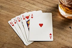 Poker Cards And Whisky Glass Royalty Free Stock Photography