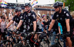 Police Officers On Bicycles At Pride Parade