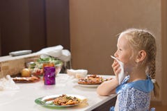 Polite Little Girl Eating Homemade Pizza Royalty Free Stock Photos