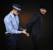 Politieagent en dief. De scène van de diefstal. stock afbeeldingen Politieagent en dief. De scène van de diefstal. stock afbeeldingen