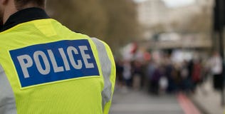 Politieteken op Jasje Politieteken op Jasje