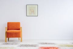 Poltrona arancio nello stile fotografie stock libere da diritti Poltrona arancio nello stile fotografie stock libere da diritti