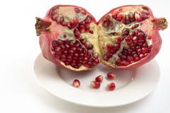 Pomegranate and pomegranate seeds stock image Pomegranate and pomegranate seeds stock image
