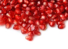 Pomegranate Seeds On White Stock Image