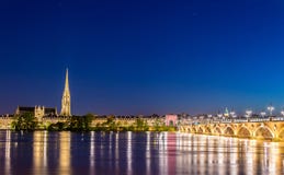 Pont de Pierre bridge and Saint Michel Basilica in Bordeaux, France royalty free stock photo Pont de Pierre bridge and Saint Michel Basilica in Bordeaux, France royalty free stock photo
