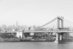 Ponte e Empire State Building de Brooklyn em New York imagem de stock royalty free Ponte e Empire State Building de Brooklyn em New York imagem de stock royalty free