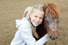 Pony and little girl and her best friend Stock Photo Pony and little girl and her best friend Stock Photo