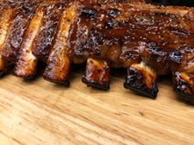 Pork Spare Ribs Barbecue on wooden plate royalty free stock photography Pork Spare Ribs Barbecue on wooden plate royalty free stock photography