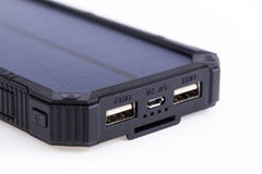 Portable solar charger for smart phone. Royalty Free Stock Photography Portable solar charger for smart phone. Royalty Free Stock Photography